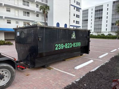 20-yard dumpster loaded with renovation debris in Southwest Florida